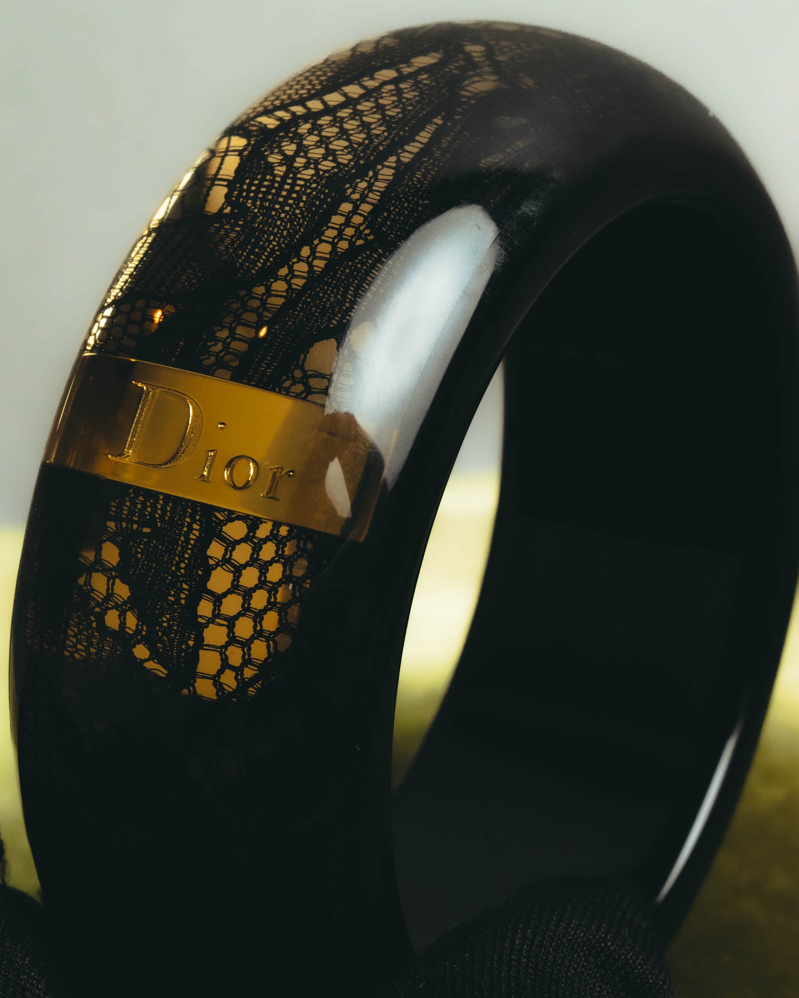 “Dior” 2002-2010 Lace embedded lucite bangle