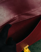 “Cartier” 80’s-90’s Must de Cartier burgundy leather shoulder bag