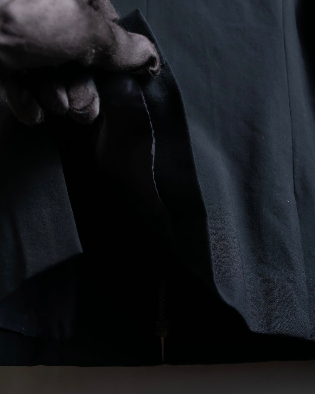 “ISSEY MIYAKE” Chin belt designed stand collar jacket