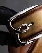 "Berluti" Patina finish curved buckle leather belt