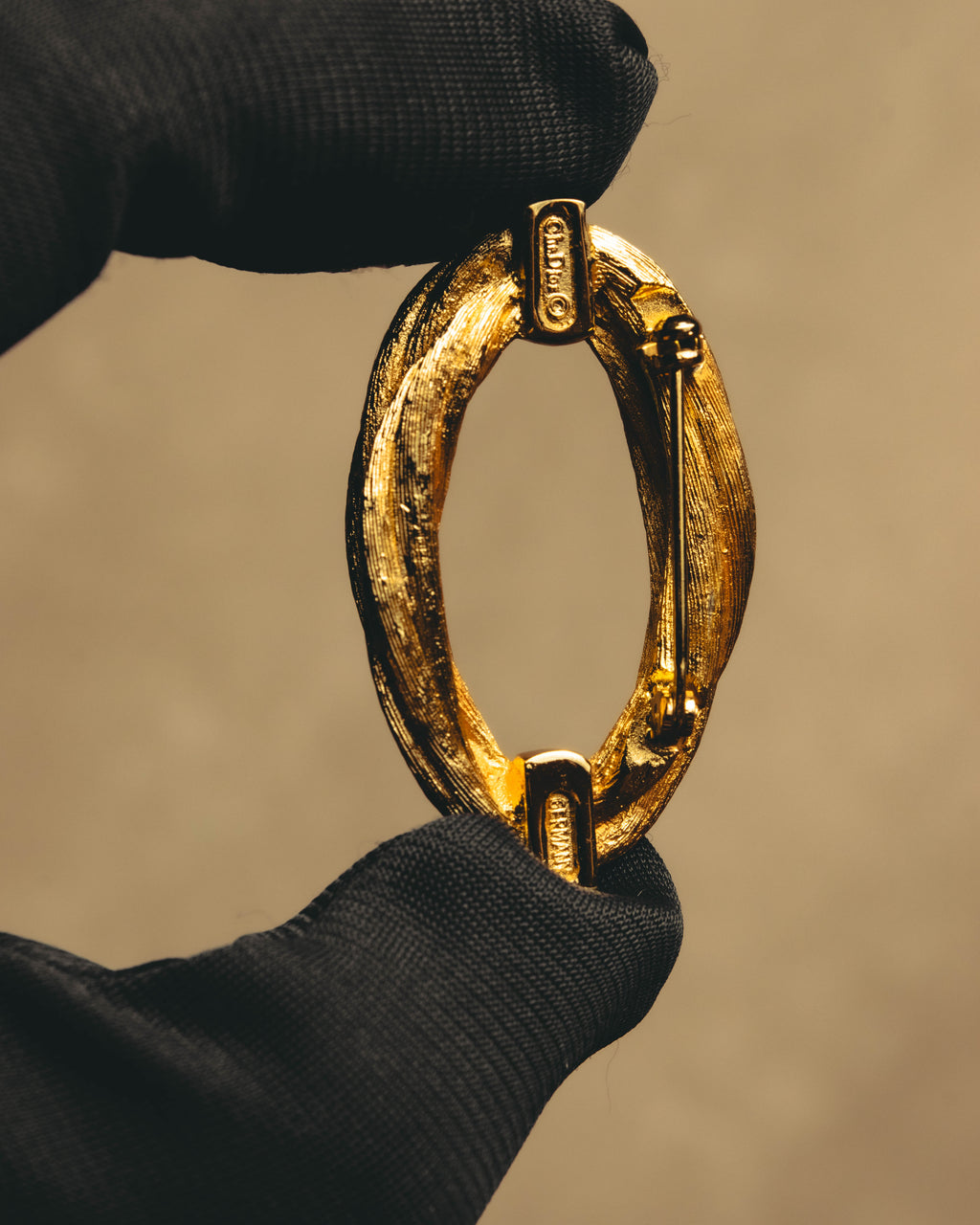 "Christian Dior" 70's Textured gold tone brooch