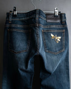 Pantalones de mezclilla con lavado de libélula de GUCCI