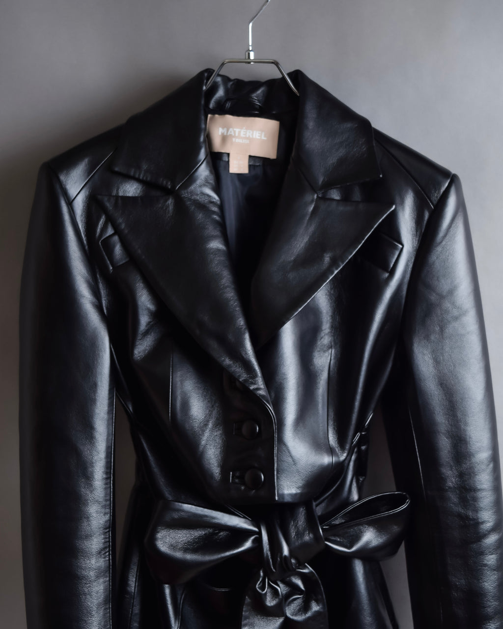 "MATÉRIEL TBILISI" Draped belted synthetic leather long jacket