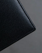 "YVES SAINT LAURENT" Cassandra logo engraved leather bi-fold wallet