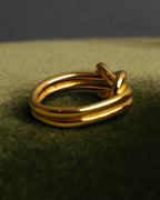 "HERMES" Sculptural gold tone knot Atame scarf ring