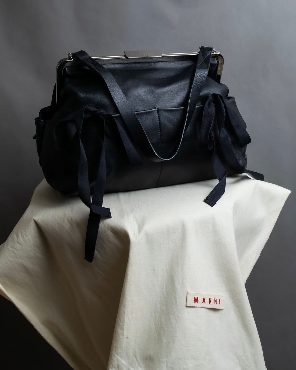 "MARNI" Side ribbon design rounded body leather bag