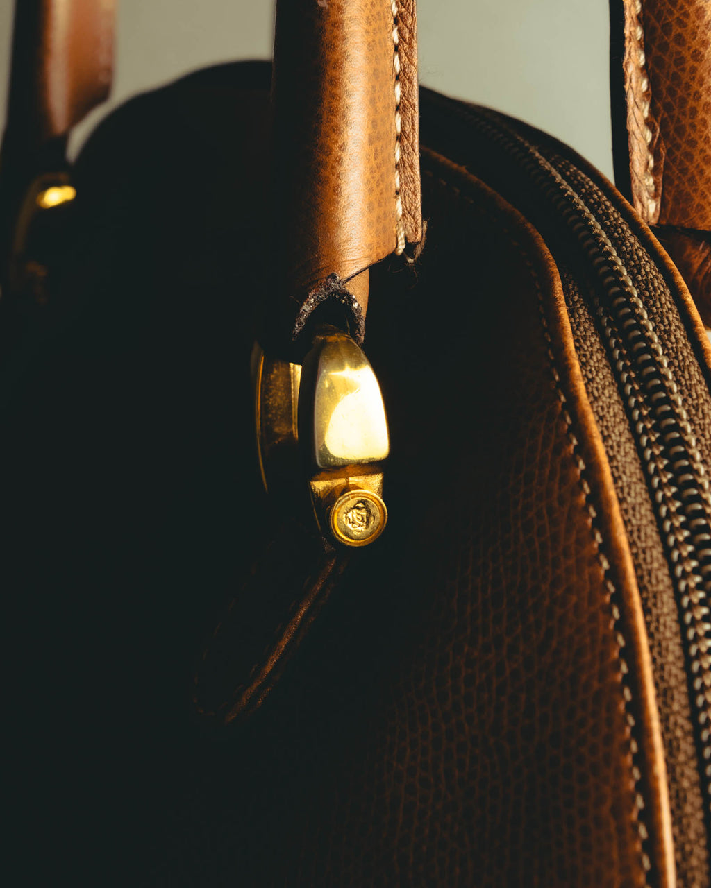 "LOEWE" 80s–00's logo embossed leather handbag