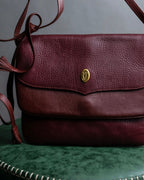 "Cartier" Texture changing bordeaux colored leather shoulder bag