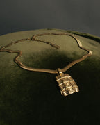 "Yves Saint Laurent" 80's-00's Gold tone textured pendant necklace