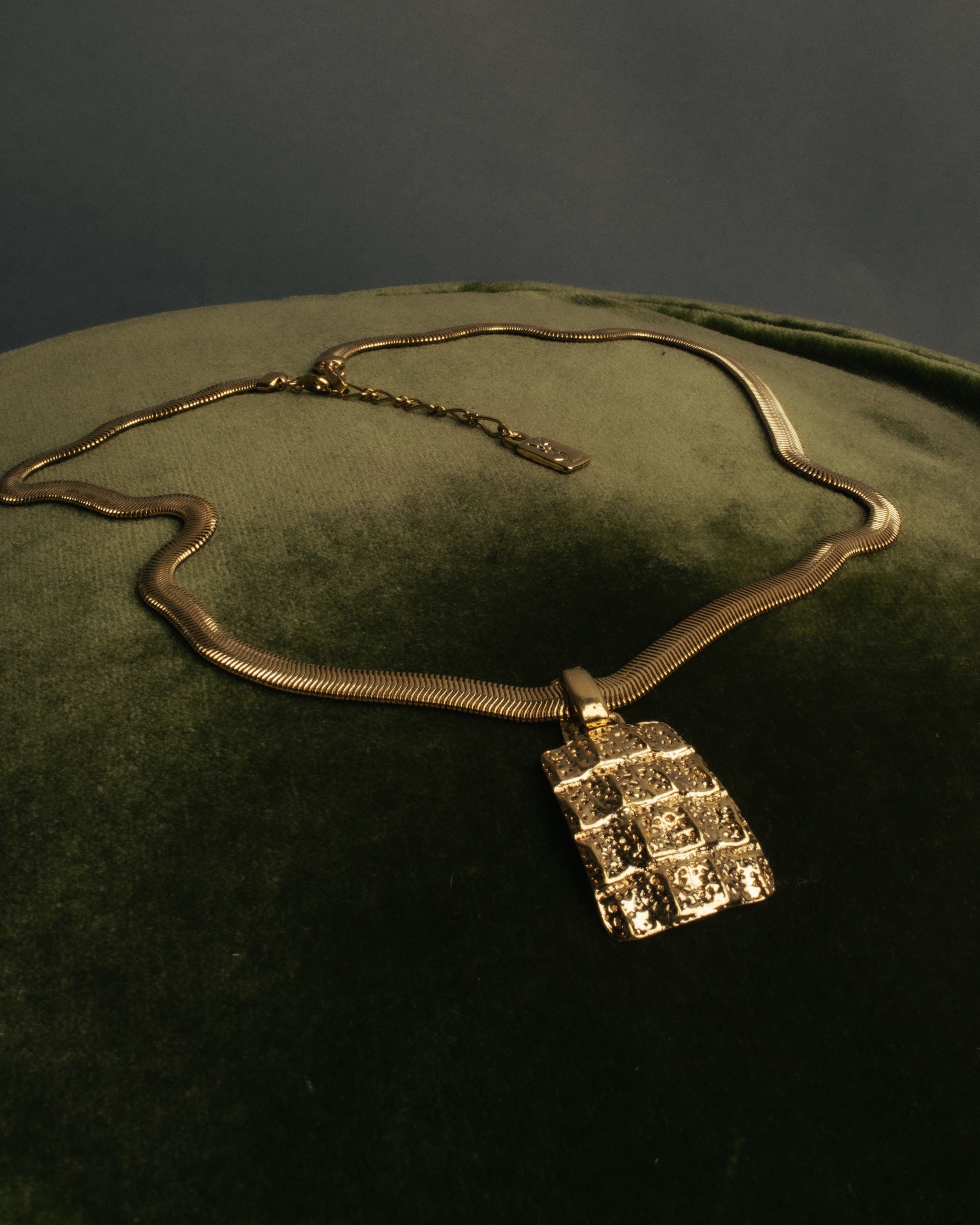 "Yves Saint Laurent" 80's-00's Gold tone textured pendant necklace