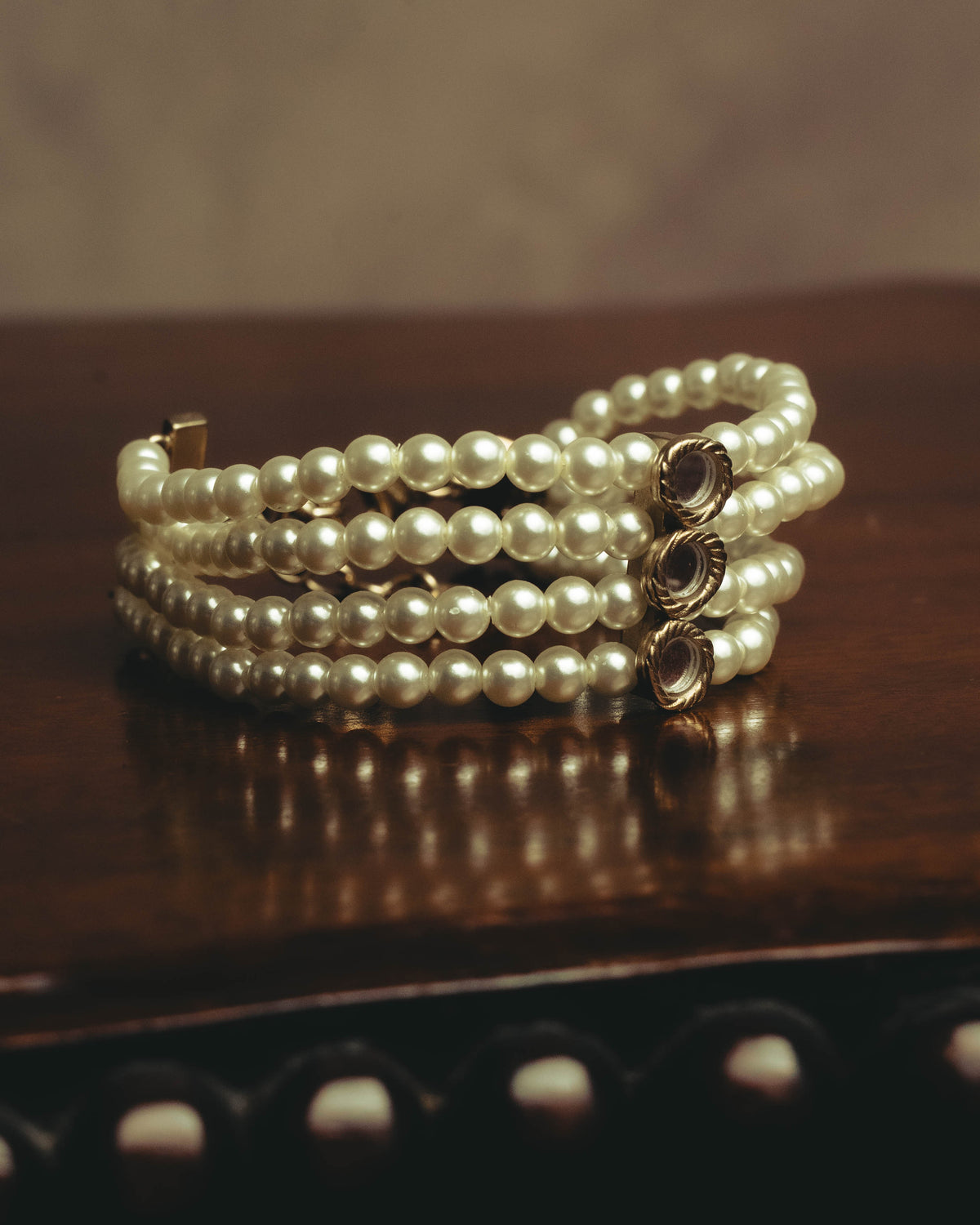 –SPECIAL– “Christian Dior” 2018-2025 Four-strand faux pearl bracelet with sculptural oval accents