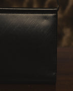"Cartier" 80's Sculptural ring-handle leather wallet