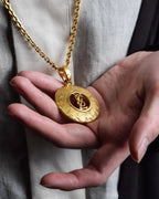 "YVES SAINT LAURENT" Embossed medallion YSL charm necklace
