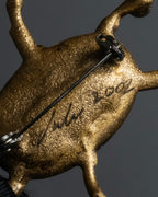 "Jerry Robertson design clock motif brooch"