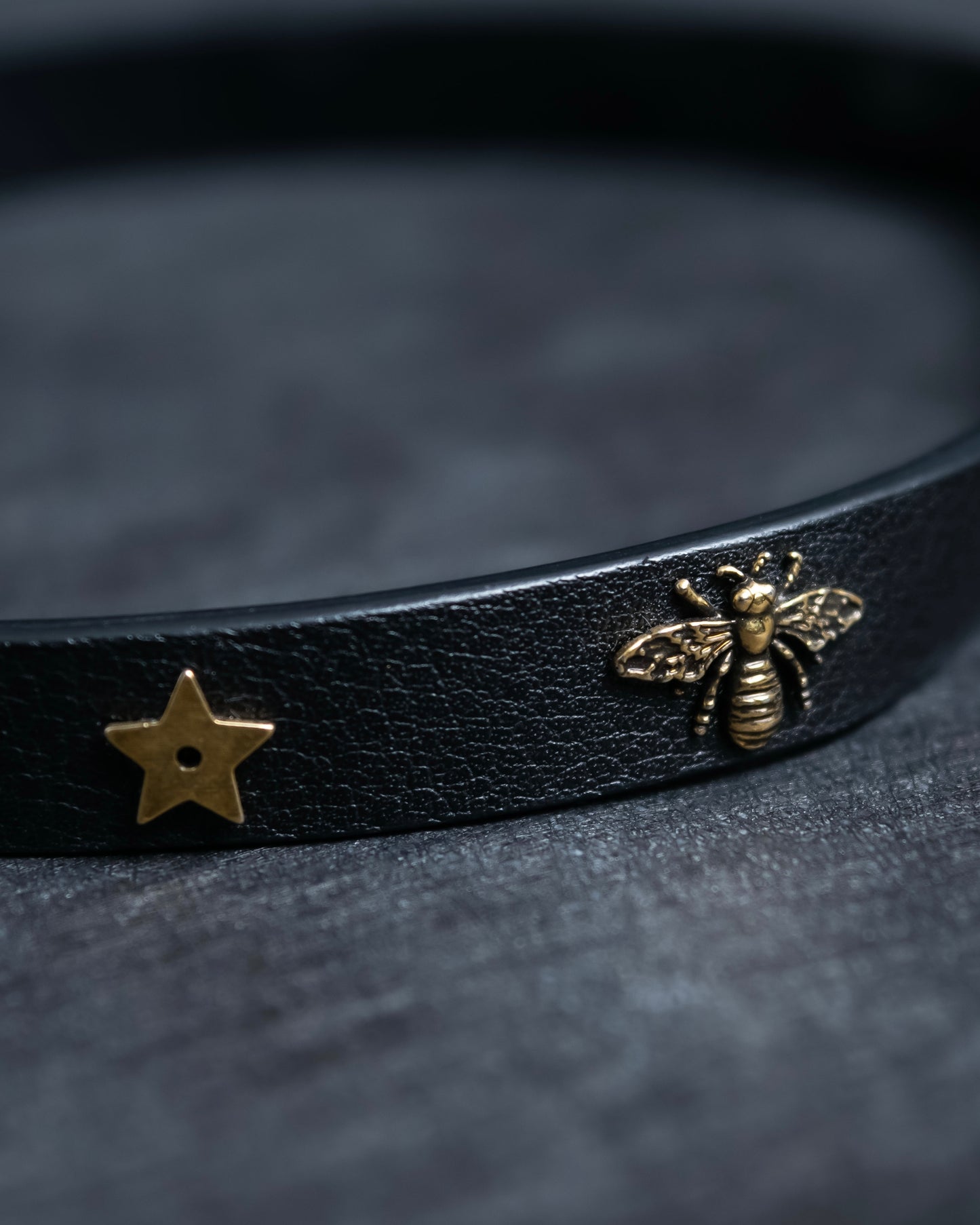 "Christian Dior" Mystical motif leather bracelet