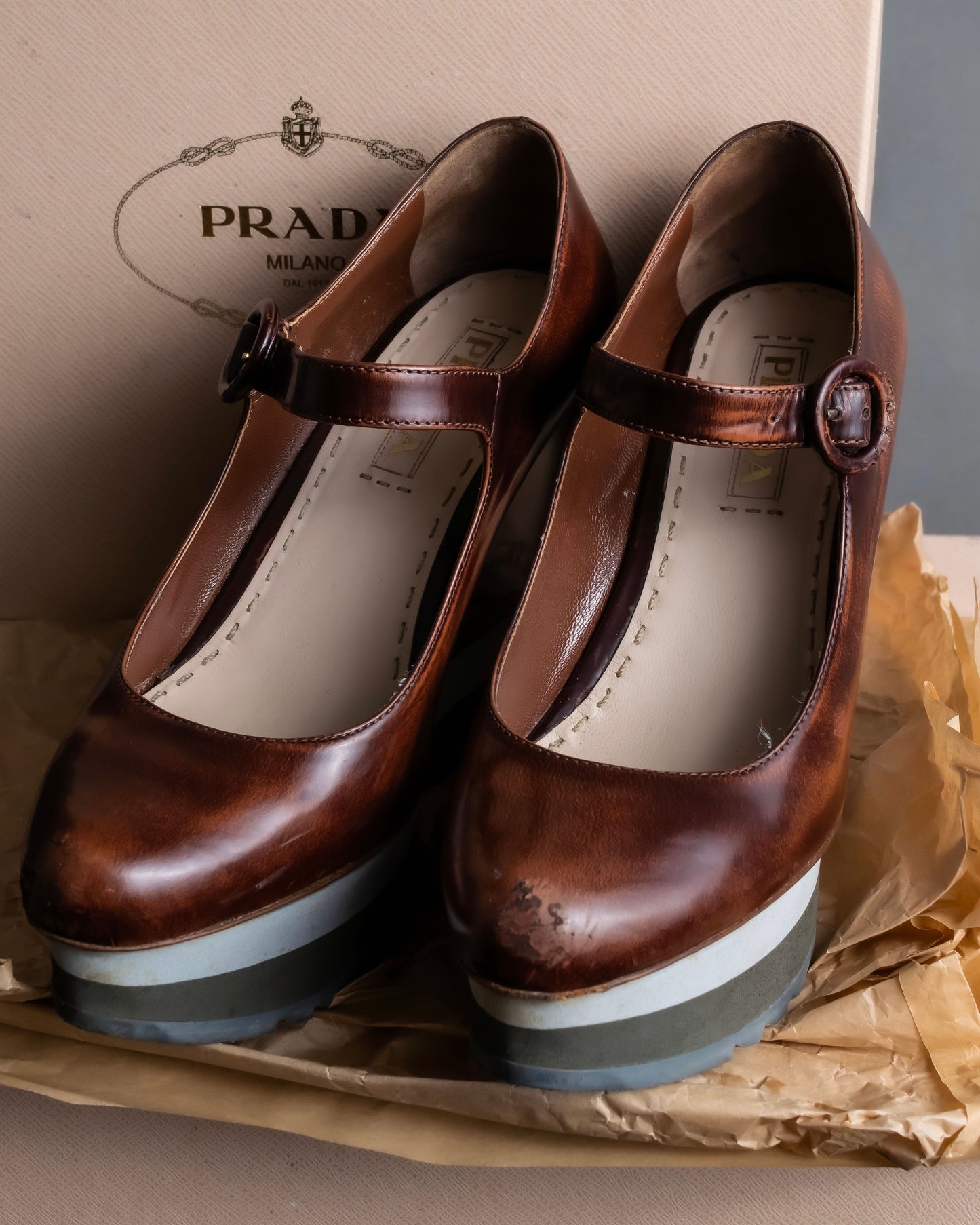 "PRADA" Brown leather stepped sole wedge heel pumps