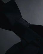 "CHANEL" 90’s black satin and grosgrain ribbon brooch