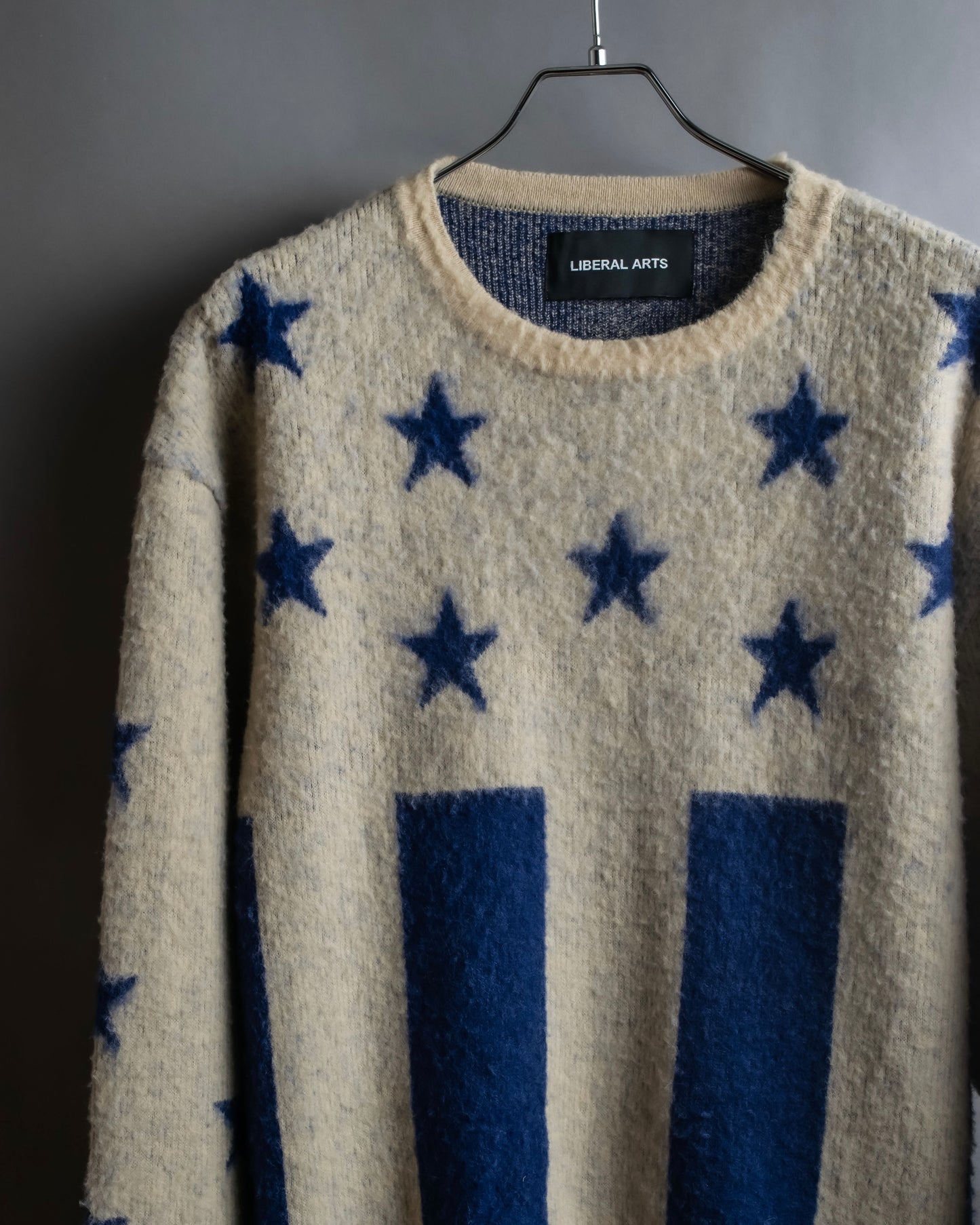 "LIBERAL ARTS" Star pattern oversized knit pullover