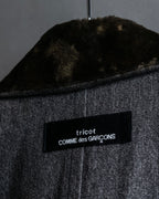 "tricot COMME des GARCONS" 
Double-breasted reversible fur tailored coat
