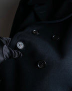 "JOHN LAWRENCE SULLIVAN"
 Large lapel double-breasted mid length coat