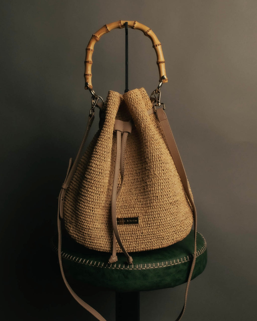 “Heidi Klein” Natural raffia bamboo handle bucket bag