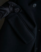 "JOHN LAWRENCE SULLIVAN"
 Large lapel double-breasted mid length coat