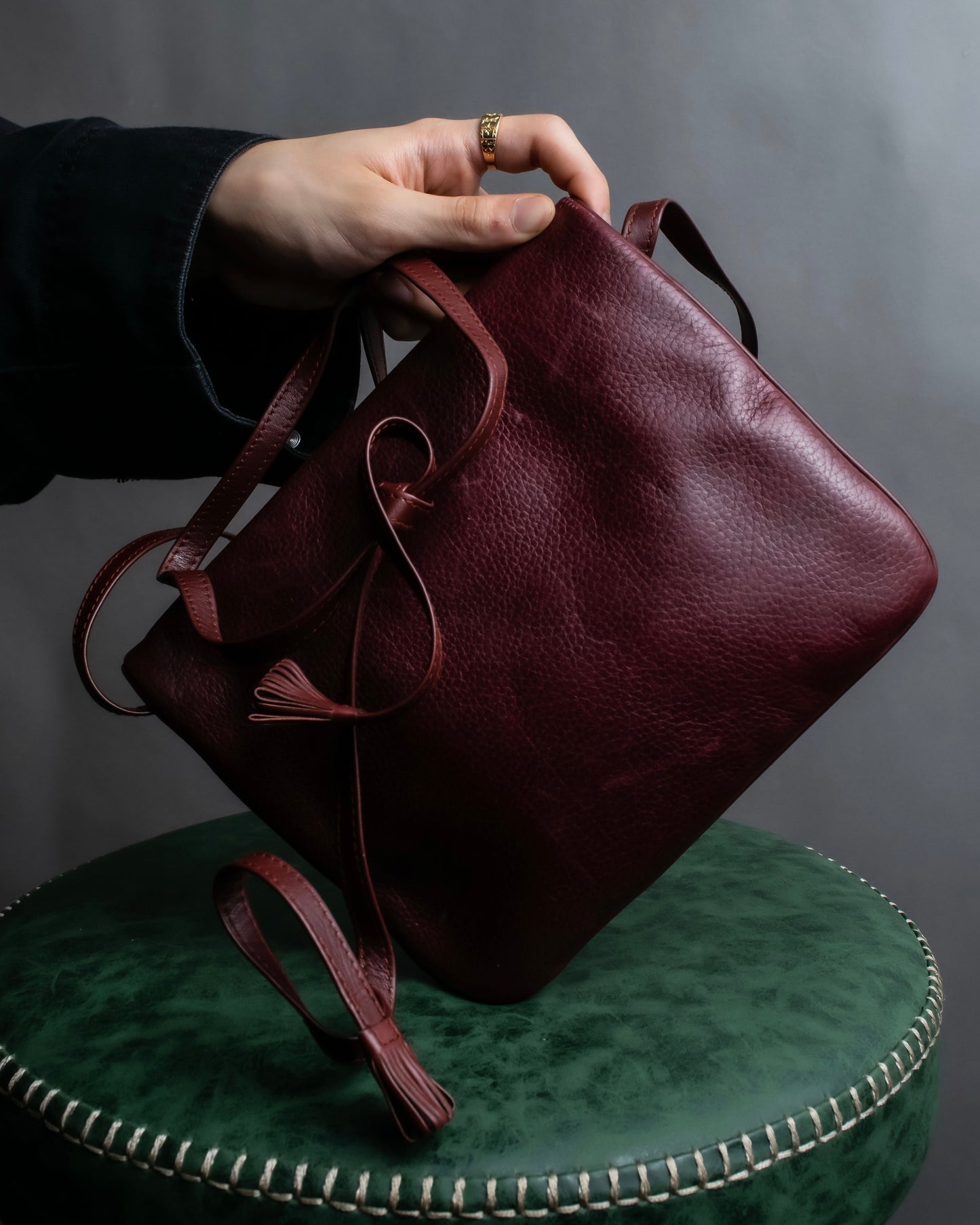 "Cartier" Texture changing bordeaux colored leather shoulder bag