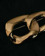 “Yves Saint Laurent” 80’s–90’s Sculptural chain motif brooch