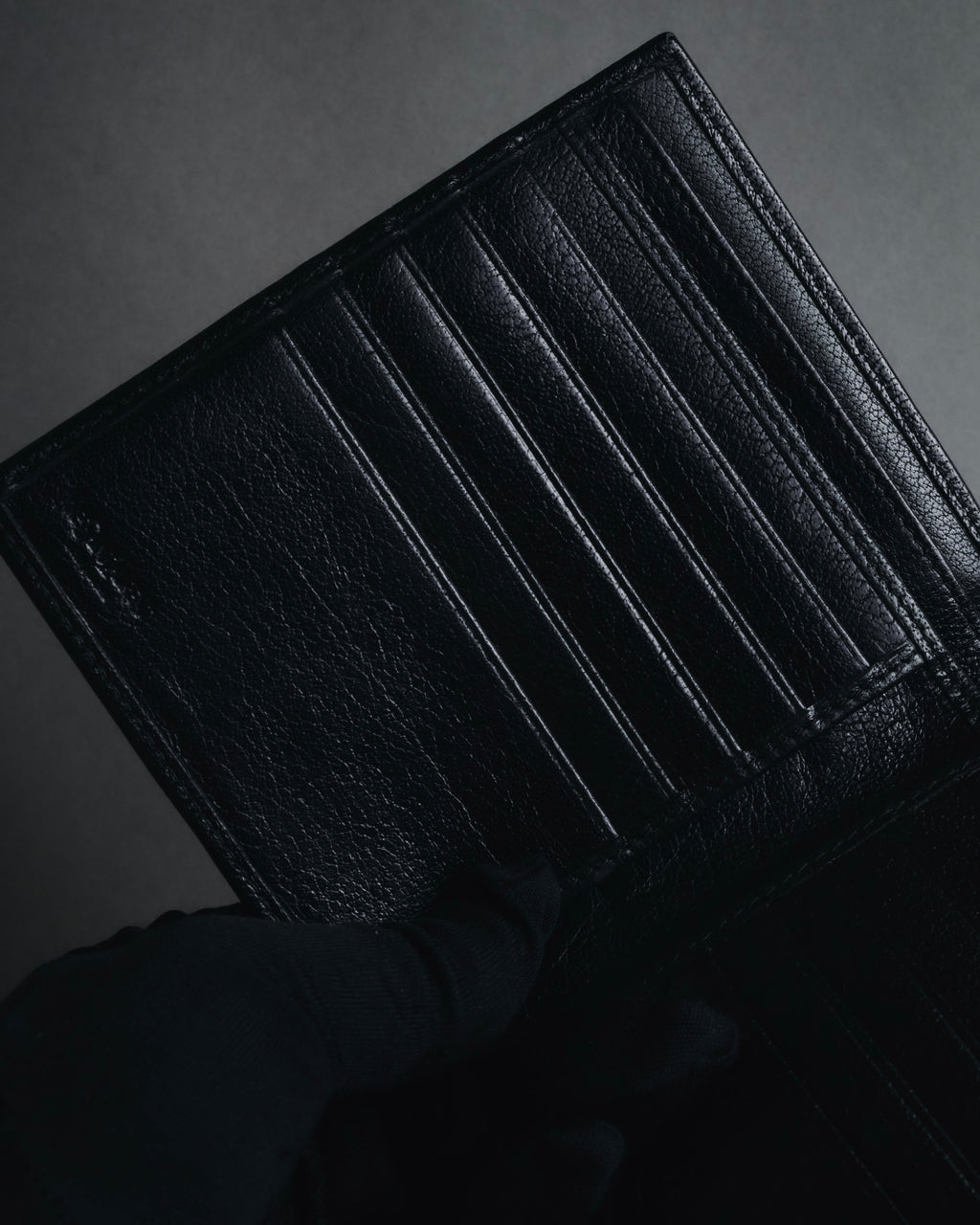 "YVES SAINT LAURENT" Stud-embellished monogram bi-fold wallet