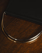 "Cartier" 80's Sculptural ring-handle leather wallet