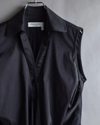 "Yves Saint Laurent Rive Gauche"
Twisted front sleeveless shirt
