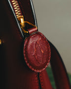 "Cartier" 80's-90's Bordeaux leather handbag