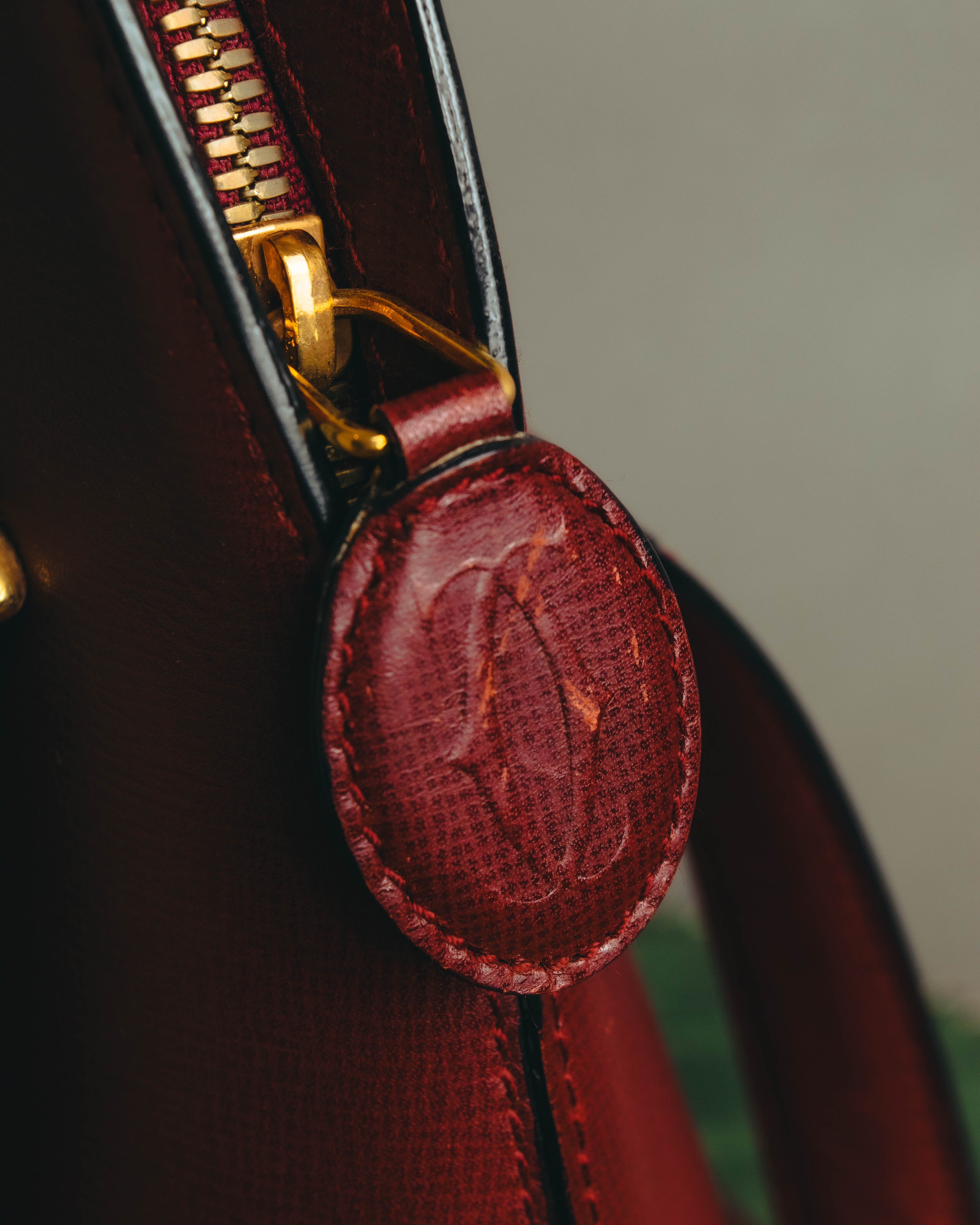 "Cartier" 80's-90's Bordeaux leather handbag