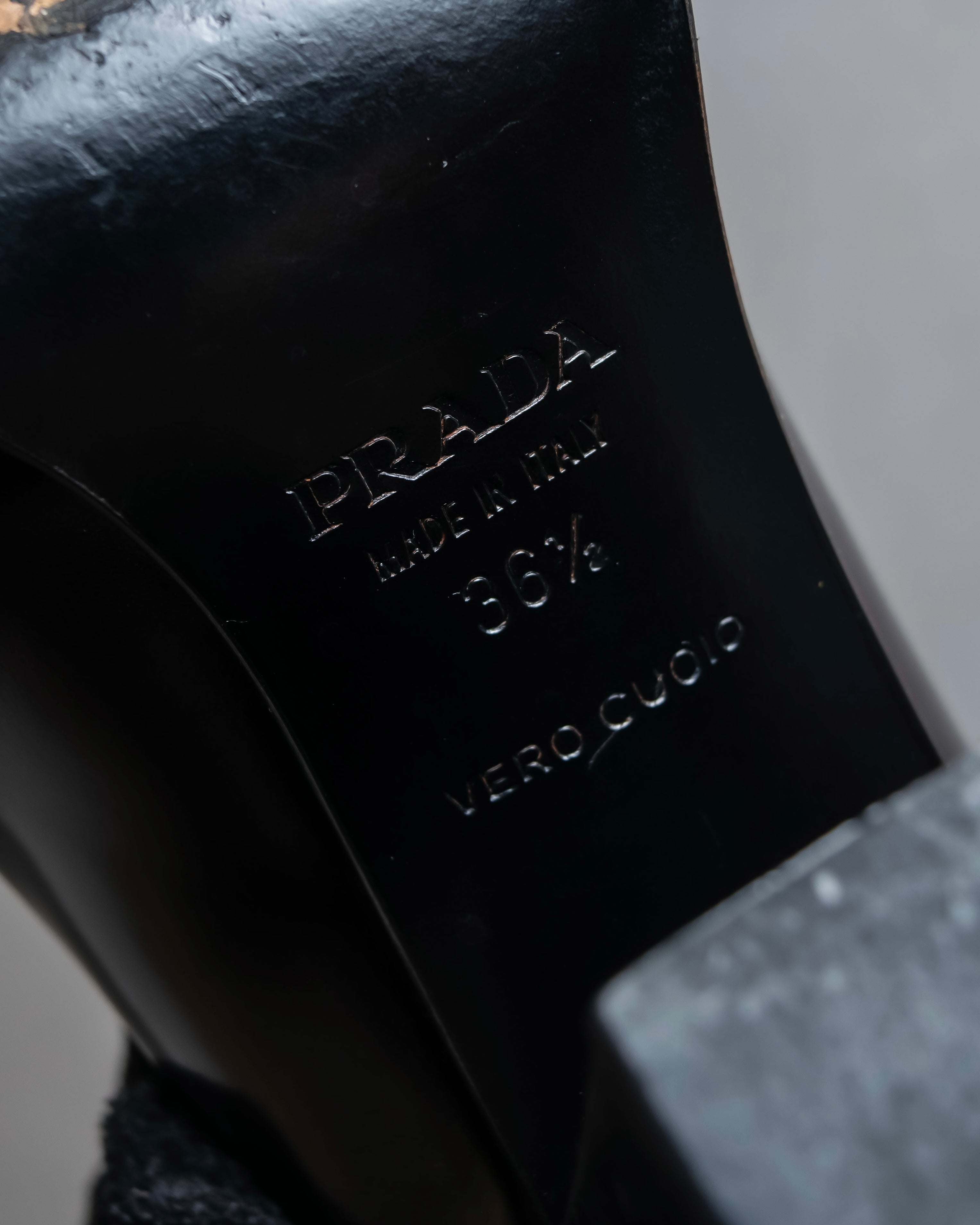 "PRADA" Metal band design leather heel loafers