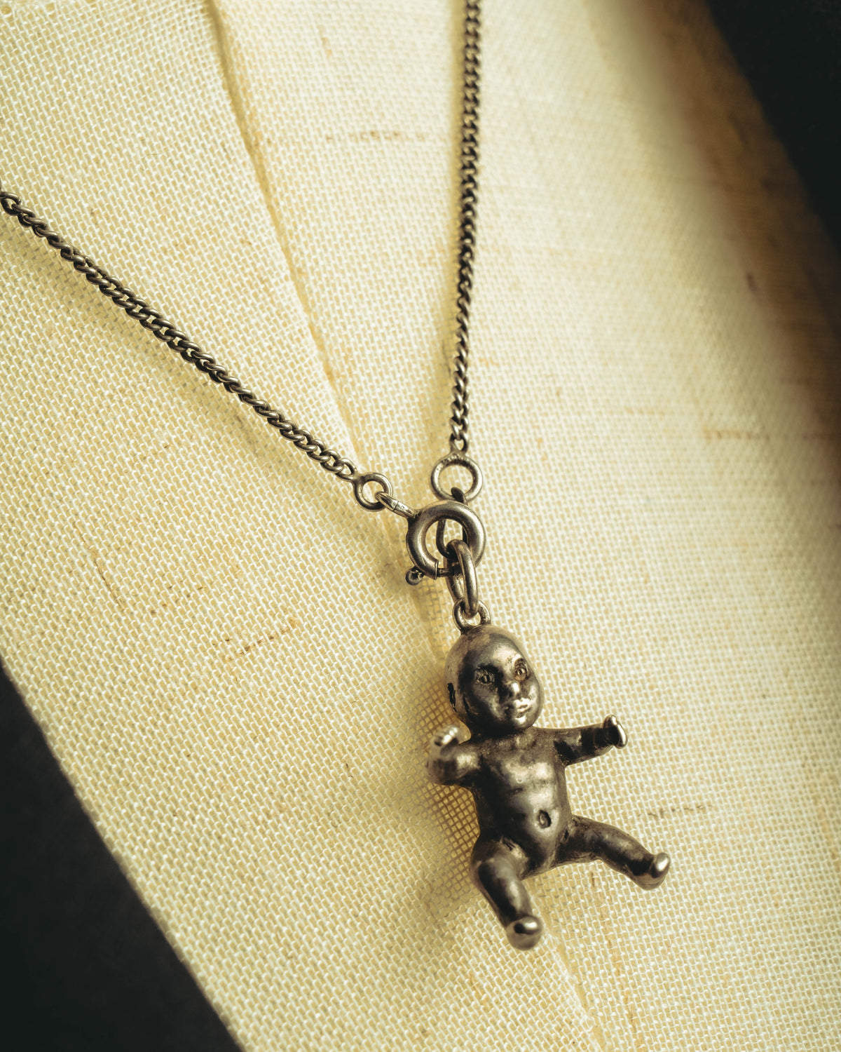 "Saint Laurent" 10's-20's Sculptural doll pendant necklace