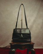 “PRADA” 90’s-00’s Nylon and leather flap messenger bag