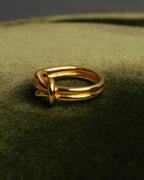 "HERMES" Sculptural gold tone knot Atame scarf ring