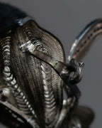 "Vintage petal motif broach"