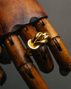 "HERMES" Sculptural gold tone knot Atame scarf ring