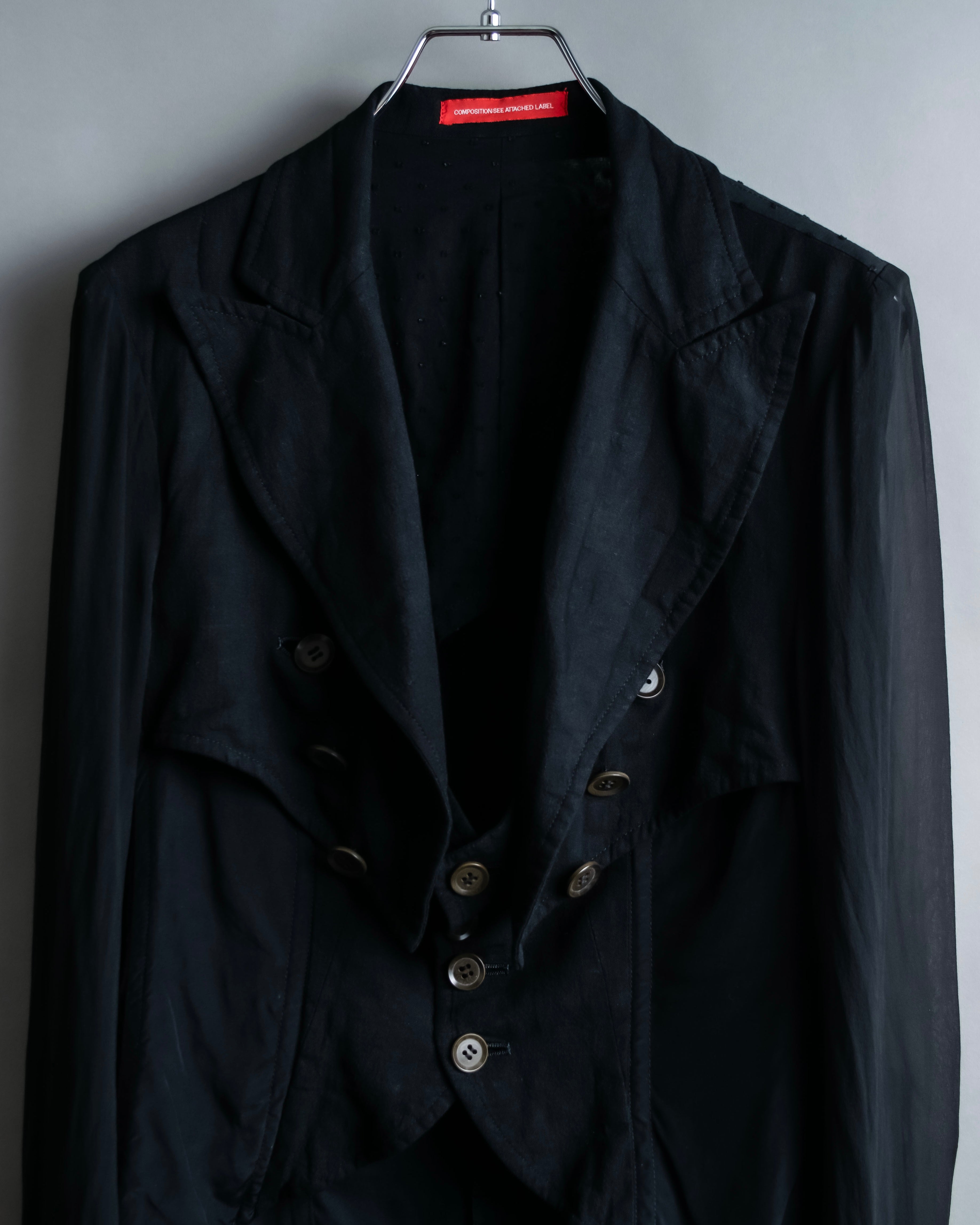 “Y’s COMPOSITION: SEE ATTACHED LABEL” Layered design multi buttons tail coat