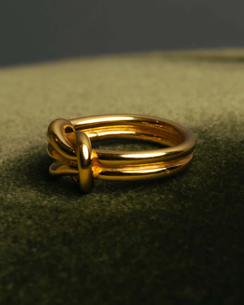 "HERMES" Sculptural gold tone knot Atame scarf ring