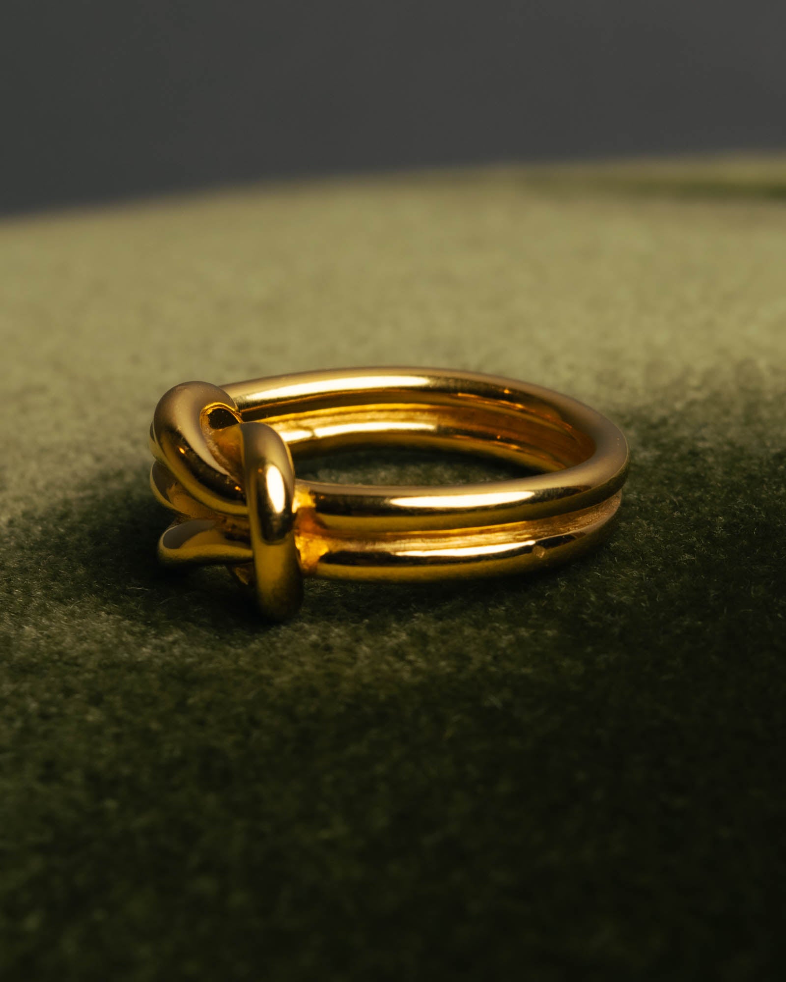 "HERMES" Sculptural gold tone knot Atame scarf ring