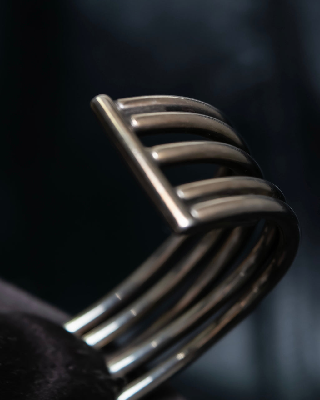 “PHILIPPE AUDIBERT” Crossed 5 line silver bangle