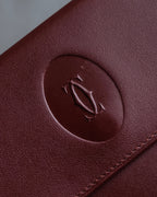 "Cartier" Les Must de Cartier bordeaux color leather wallet