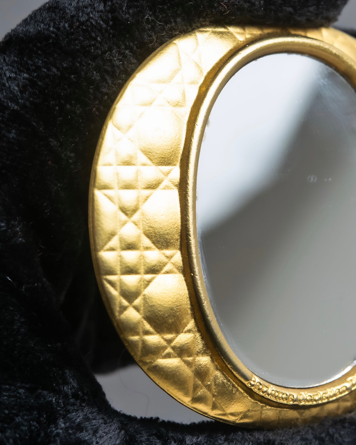 "Christian Dior" Cannage pattern engraved gold hand mirror