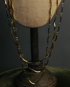 "Yves Saint Laurent" 80's-90's Gold tone multi chain necklace