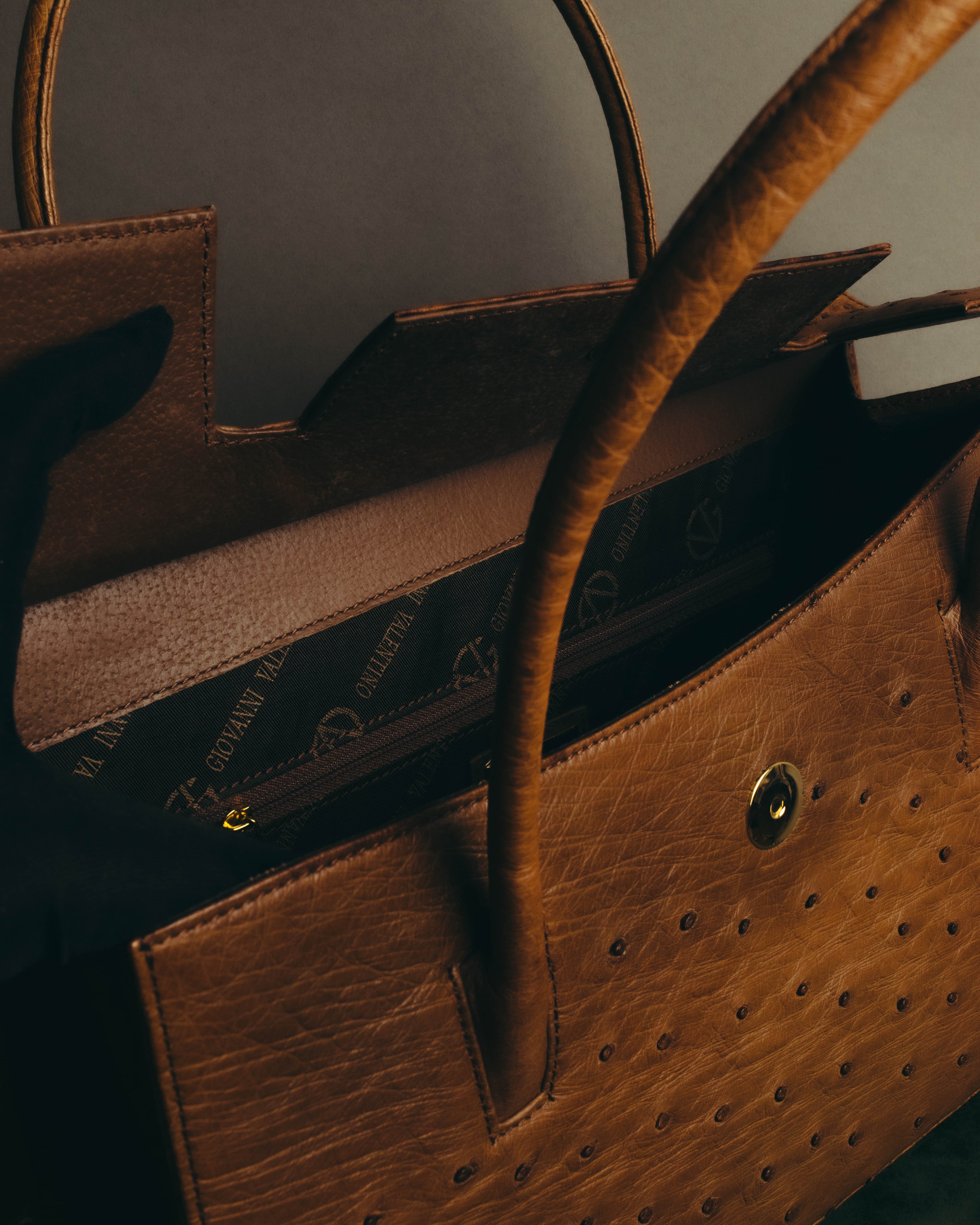 “GIOVANNI VALENTINO” Structured ostrich top handle bag