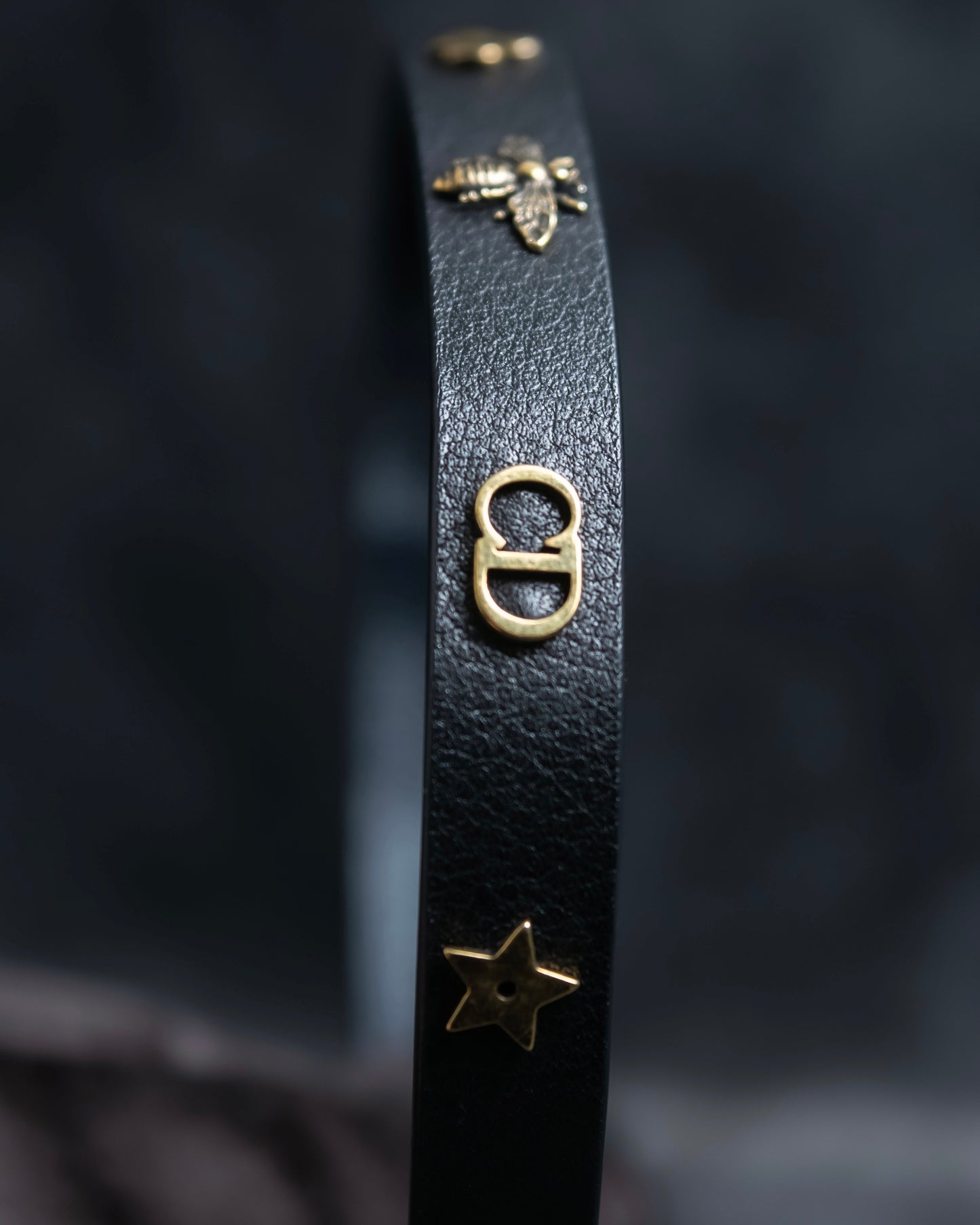 "Christian Dior" Mystical motif leather bracelet