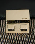 "GUCCI" Canvas and leather bi-fold wallet