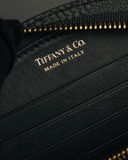 "Tiffany & Co." 10's-20's Embossed leather wristlet wallet